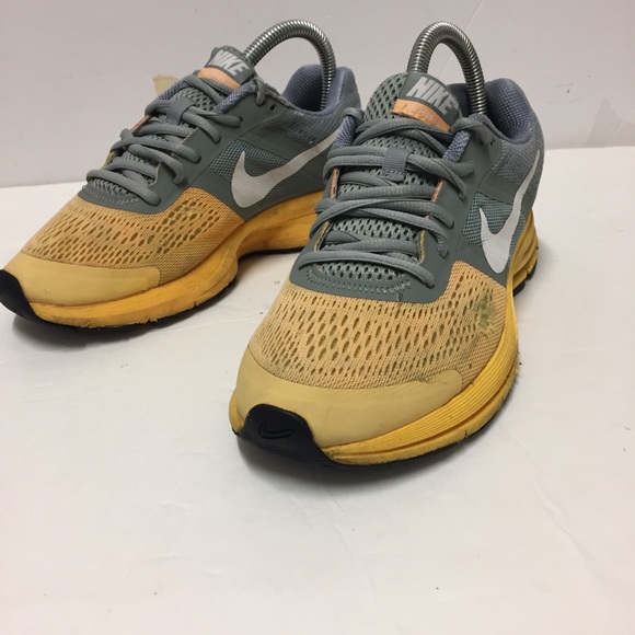 grey and yellow nike shoes